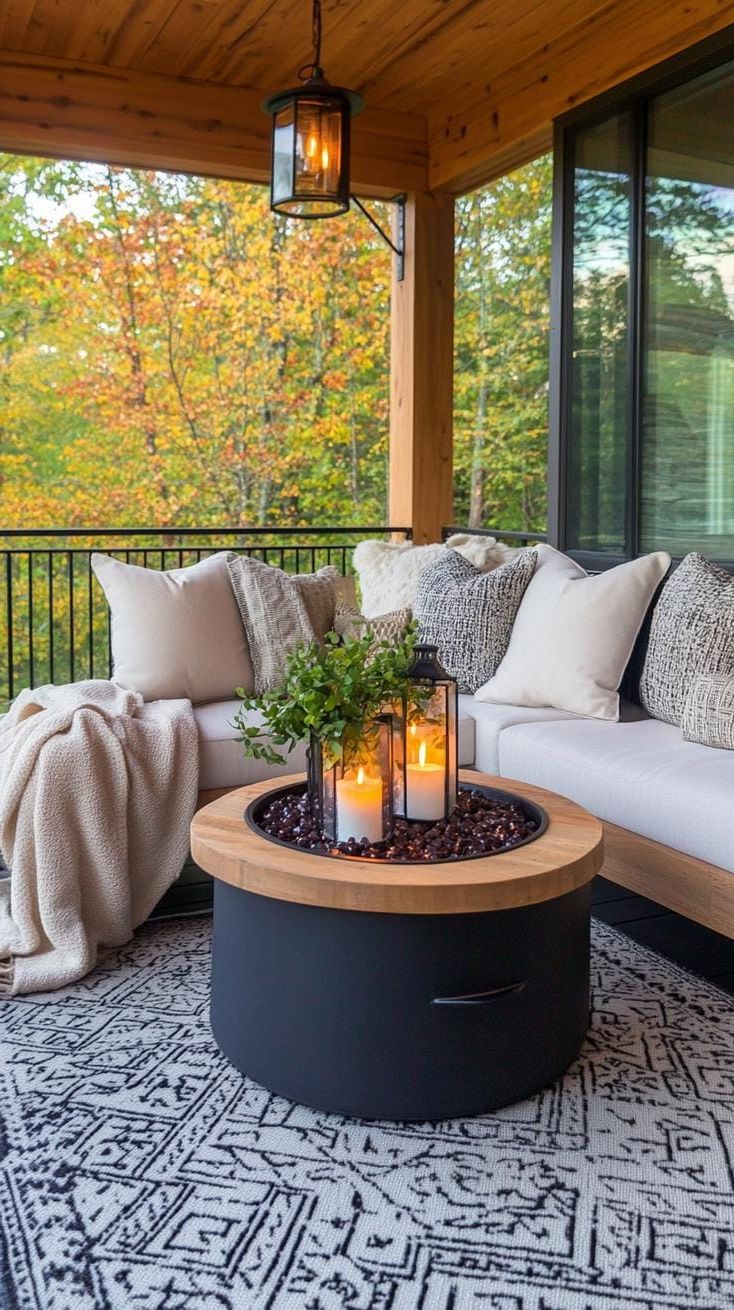 25 Beautiful Front Porch Ideas to Elevate Your Home Style 69 25. All-season retreat: Layer cozy textiles, lanterns, and a fire pit table to merge comfort with function year-round-0