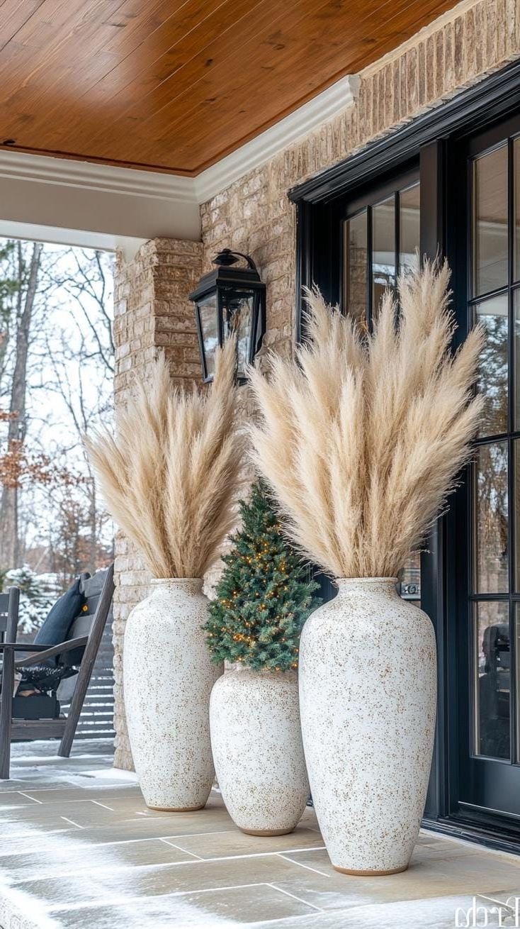 15 Gorgeous Winter Porch Decor Ideas to Spark Your Creativity 42 14. Tall Ceramic Vases with Sparkling White Pampas Grass-1