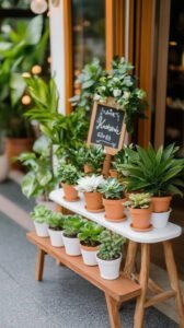 21. Potted plant wedding favors with handwritten chalkboard sign 1