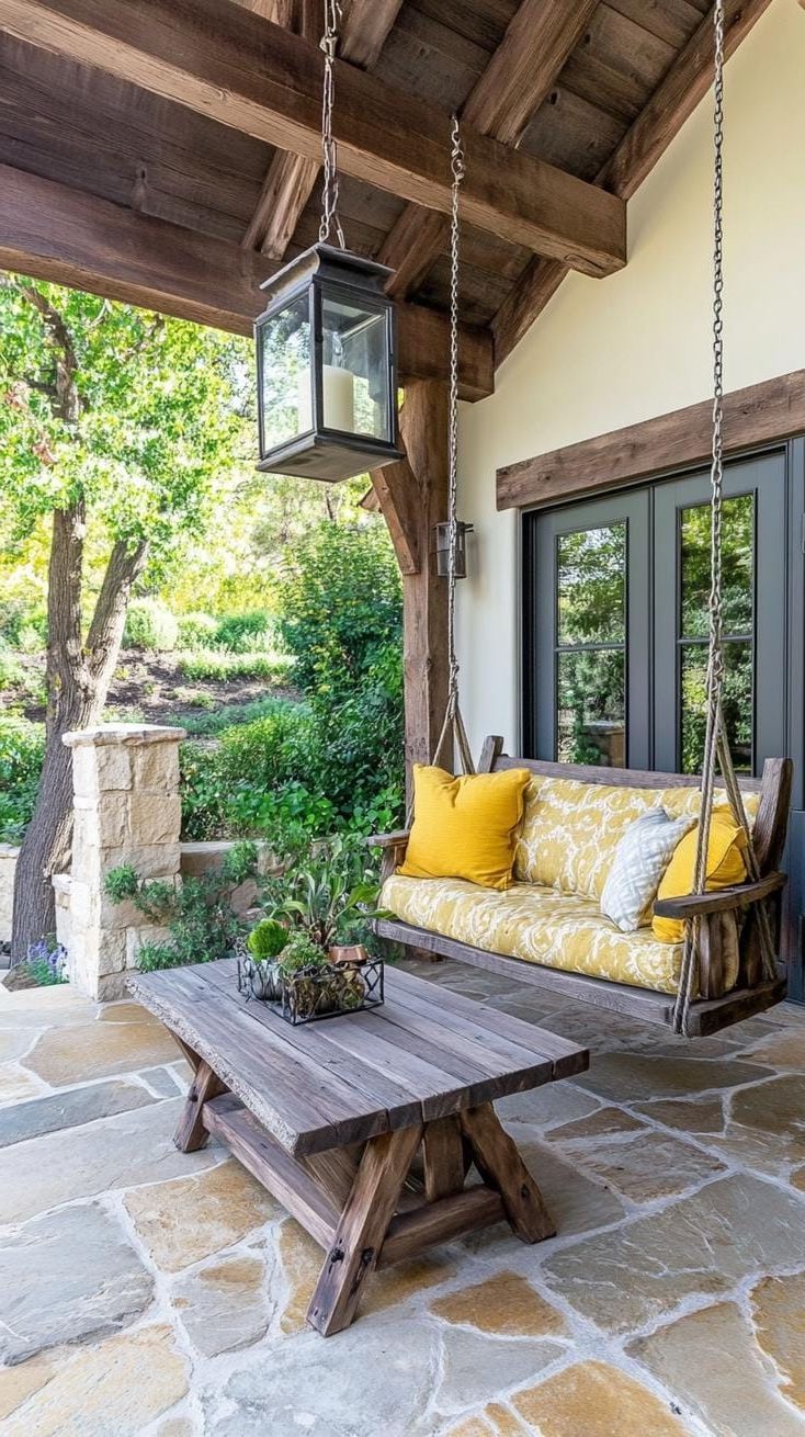 22. Rustic barn-style patio with swinging chair-1