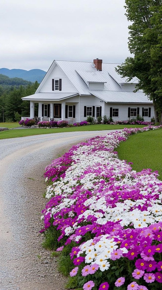 8. Flower beds spilling along crushed gravel driveway-0