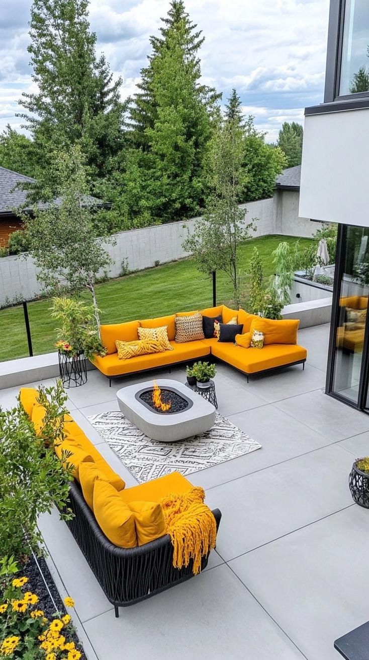 14. Concrete patio with curved seating around fire pit-1