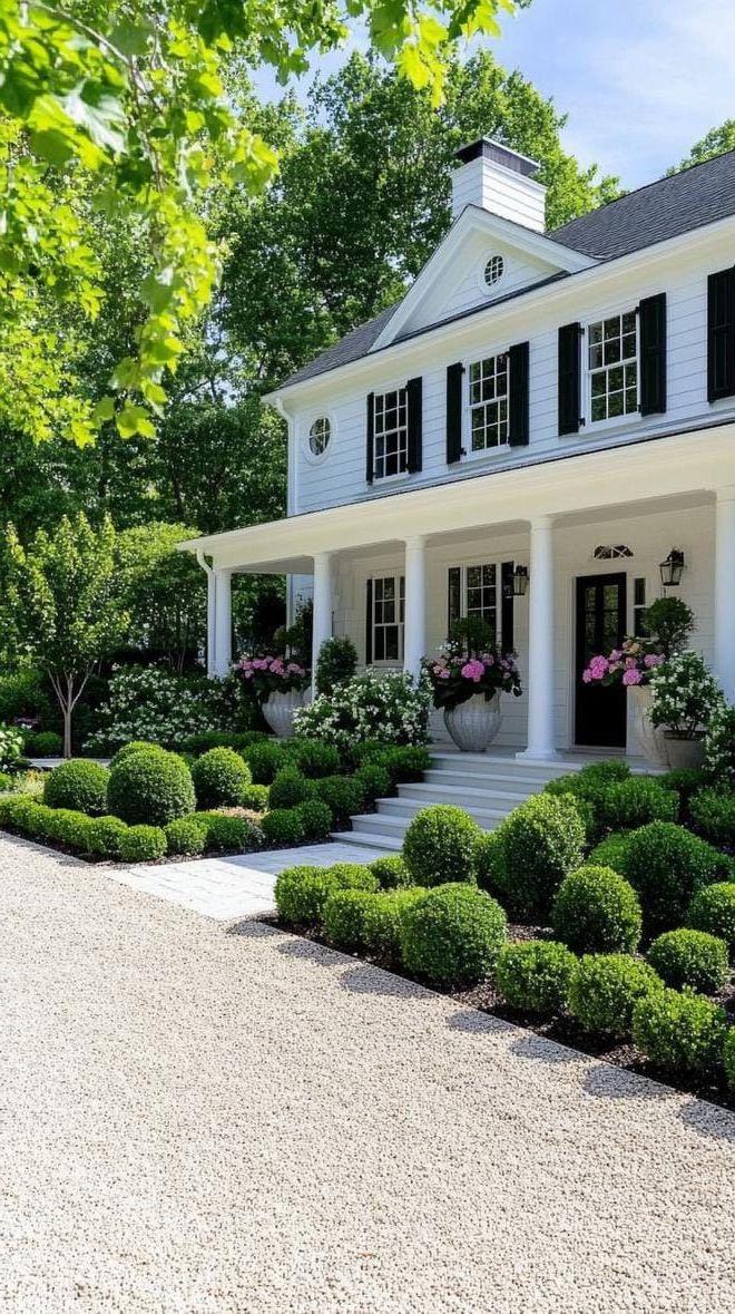 15. Minimalist farmhouse garden with sculpted boxwoods-1