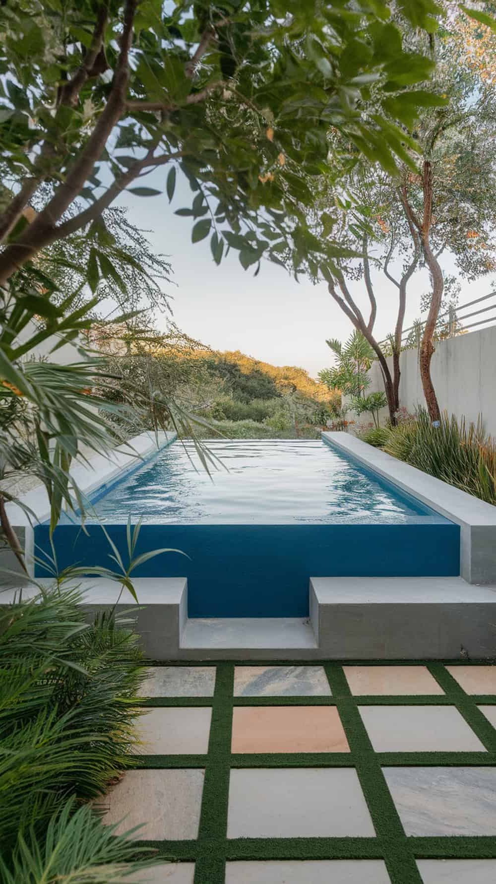 A raised pool surrounded by greenery and built-in seating.