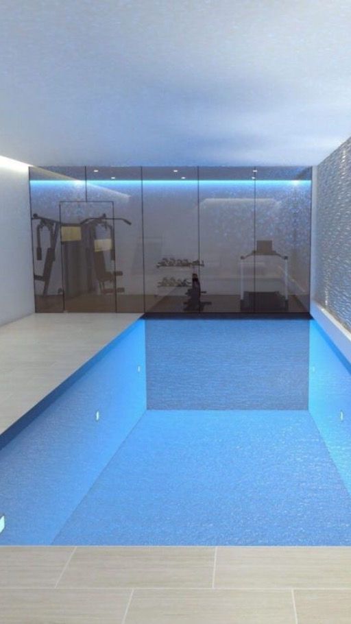 swimming pool in basement Basement Oasis: Luxury Unveiled