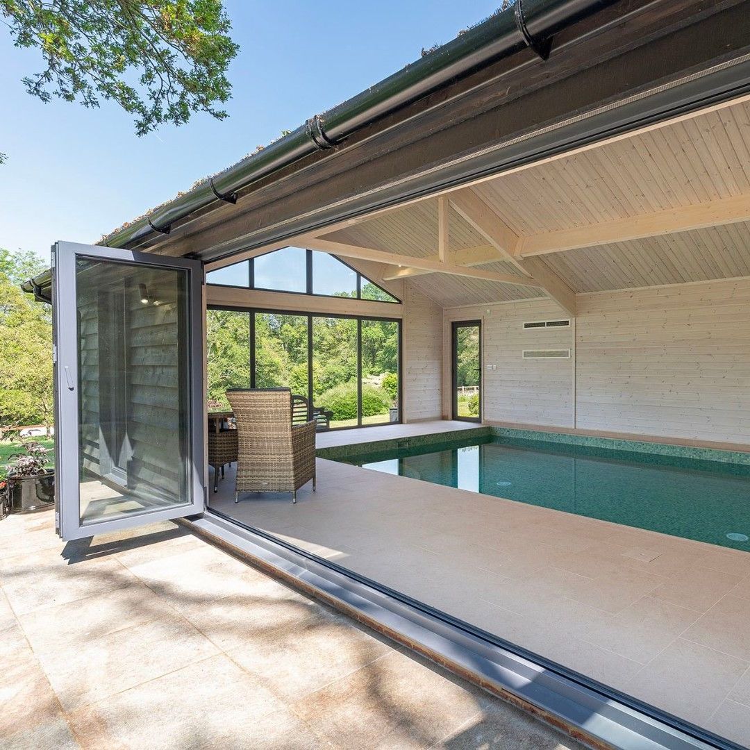 swimming pool in basement Basement Oasis: Modern Swim Haven