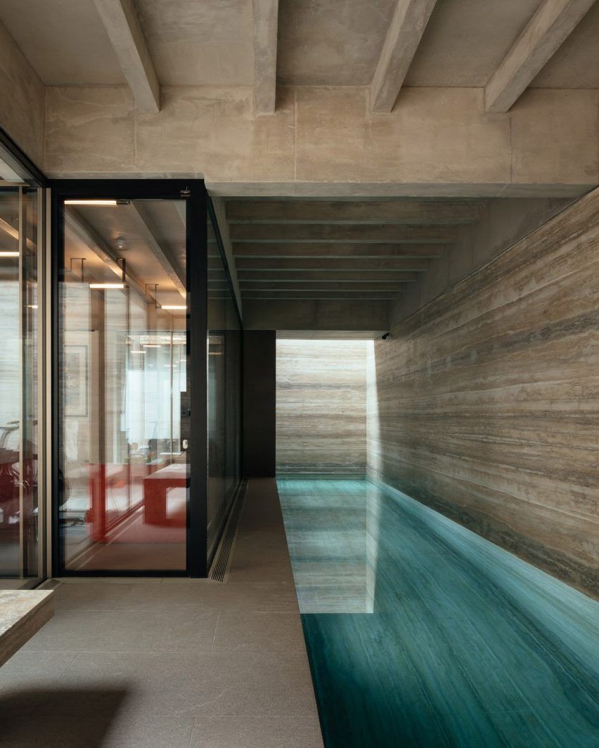 swimming pool in basement Basement Oasis: A Modern Retreat