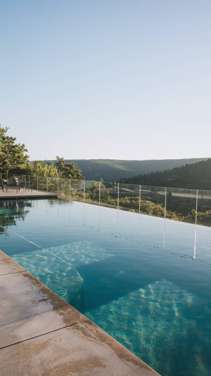 20 Pool Designs That Will Make a Splash in Your Outdoor Space 20 19. Infinity Pool with Valley View