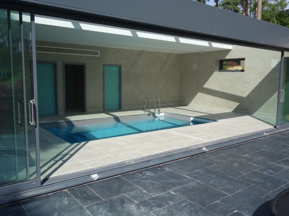 swimming pool in basement Basement Oasis: A Swim Hideaway