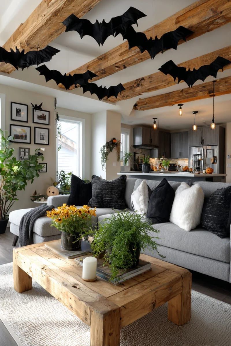 21 Spooky Hacks for Unique Halloween Home Decorations Ideas 26 hanging bats made from felt and suspended from the ceiling 1
