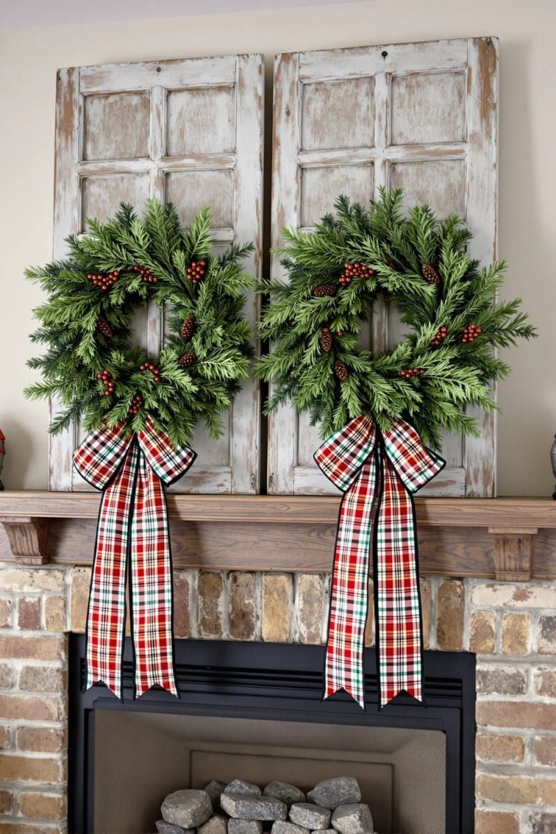 31 Cozy Rustic Decor Ideas for a Warm Xmas 71 repurposed wood shutters adorned with festive wreath and plaid ribbon 1