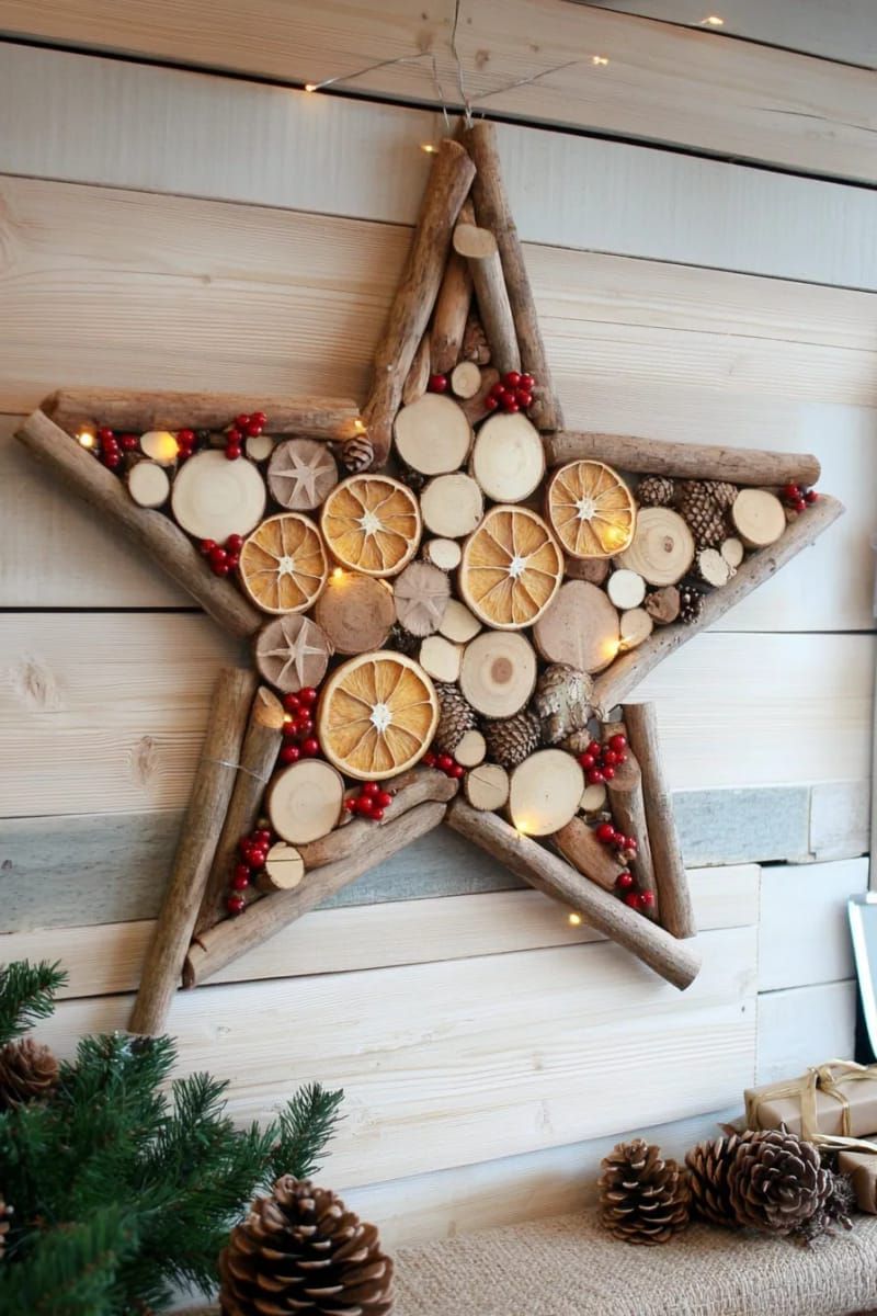 31 Cozy Rustic Decor Ideas for a Warm Xmas 33 star-shaped wall art made from dried orange slices and cinnamon sticks 1
