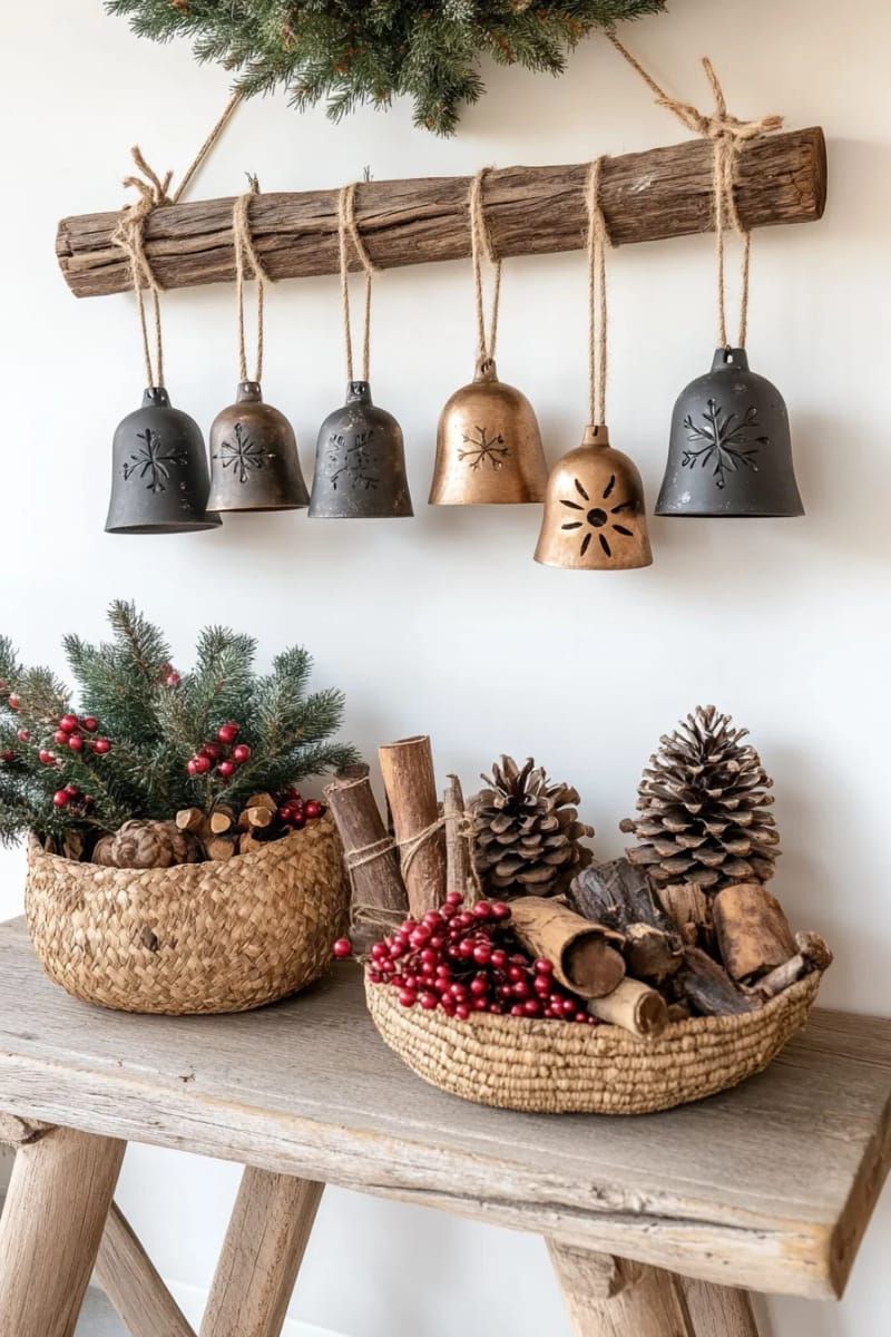 31 Cozy Rustic Decor Ideas for a Warm Xmas 59 oversized jingle bells strung above a reclaimed wood entry table 1