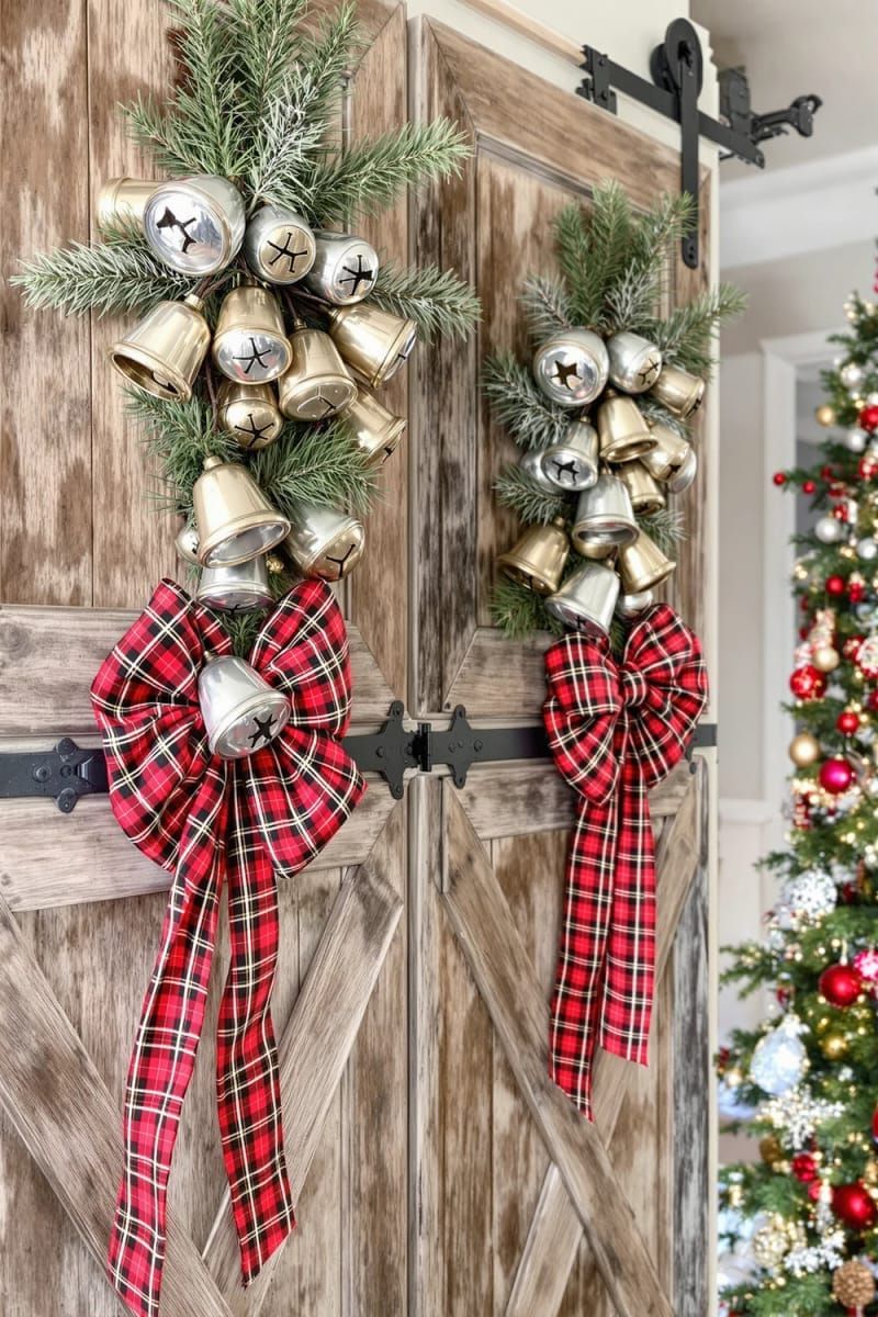 31 Cozy Rustic Decor Ideas for a Warm Xmas 54 barn door-inspired wall decor featuring metal bells and red plaid bows 1