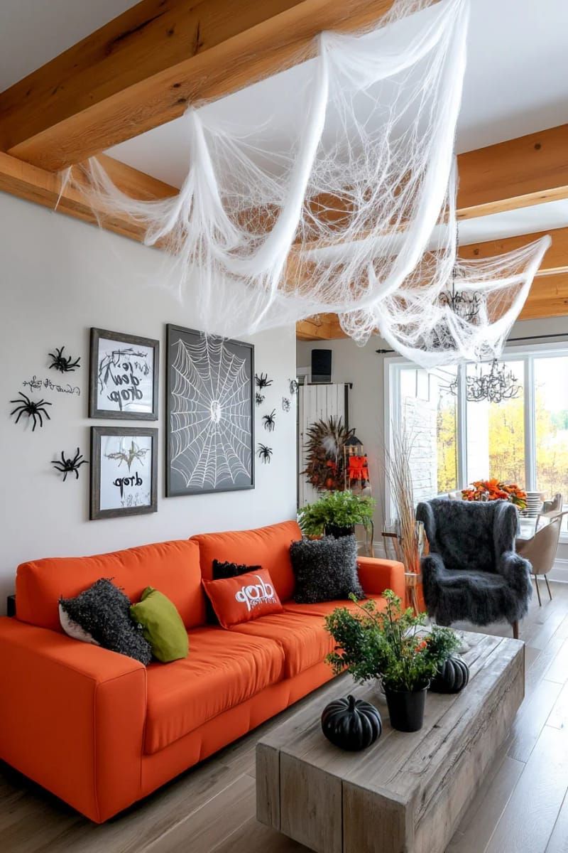 Spooky Chic: 21 Must-Try Halloween Party Decor Ideas! 33 faux spiderweb ceiling canopy with crystal “dew drop” beads 1